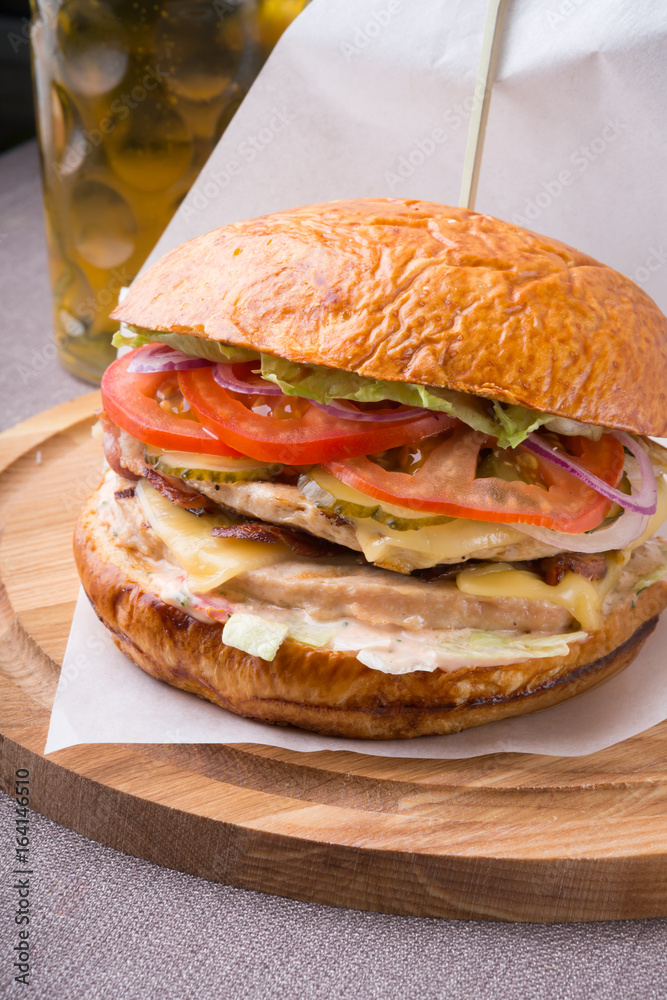 Hamburger on a wooden board Hamburger on a wooden board