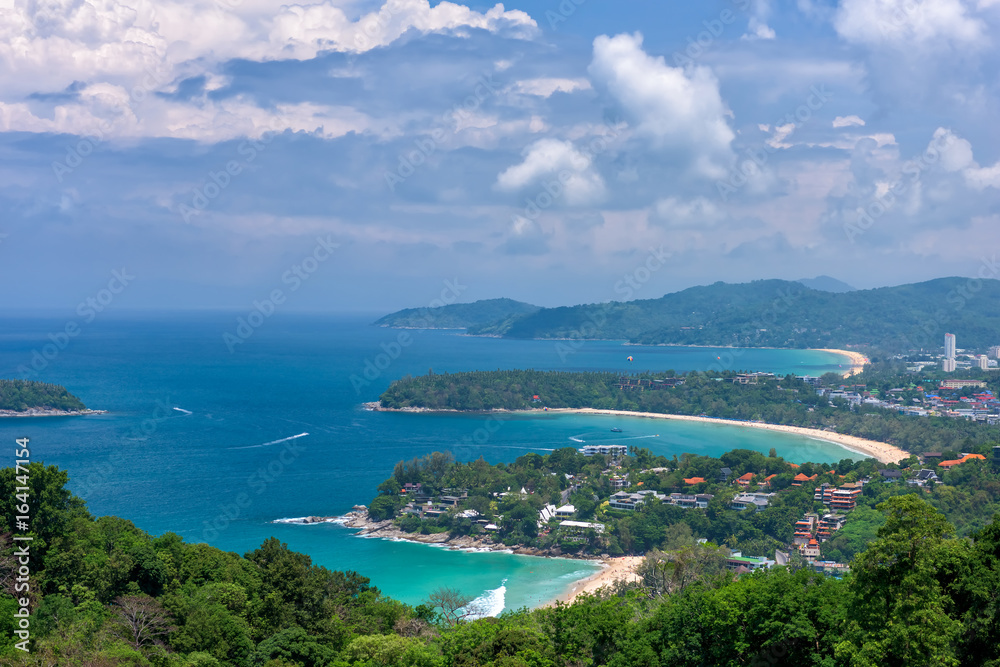 Tropical beach landscape with beautiful turquoise ocean waives and sandy coastline from high view point. Kata and Karon beaches, Phuket, Thailand