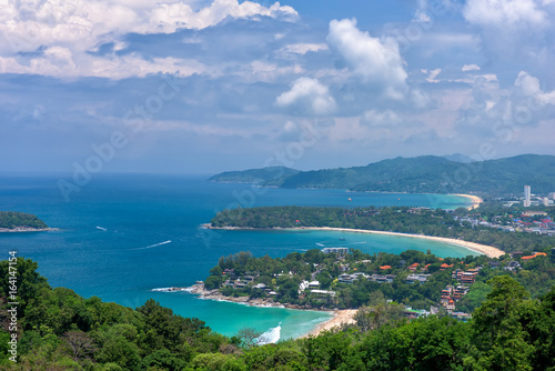 Tropical beach landscape with beautiful turquoise ocean waives and sandy coastline from high view point. Kata and Karon beaches, Phuket, Thailand © yotrakbutda
