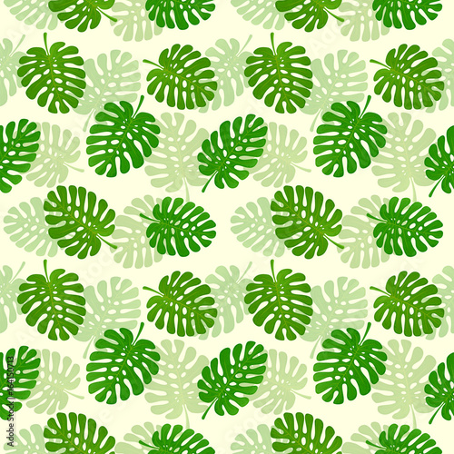 Seamless background with set of palm leaves