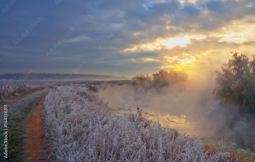 Fototapeta premium Foggy Sunrise Over The River