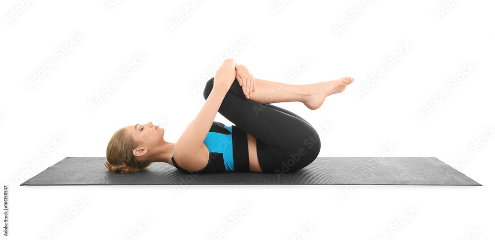 Young beautiful woman practicing yoga pose on white background Young beautiful woman practicing yoga pose on white background