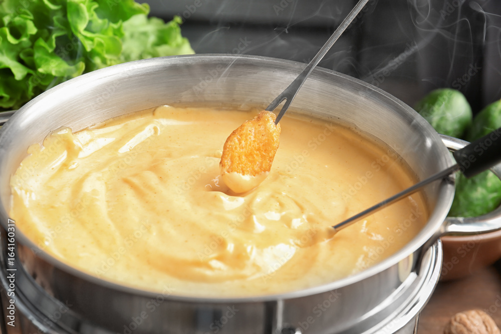 Rusk and cheese fondue, closeup Rusk and cheese fondue, closeup