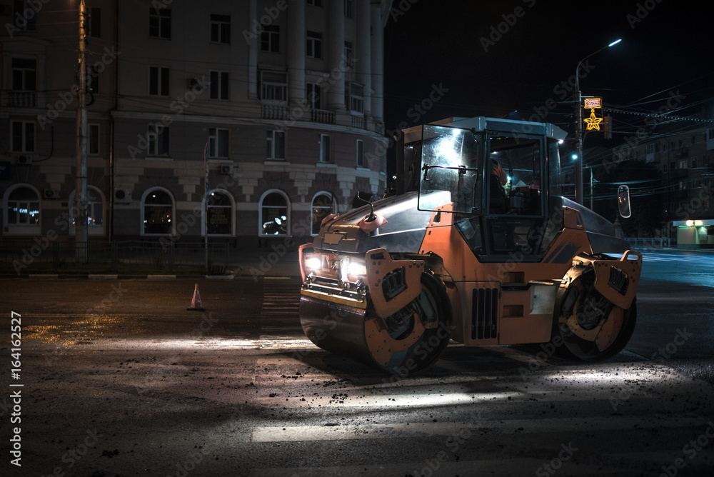 Asphalt paving with road roller Asphalt paving with road roller