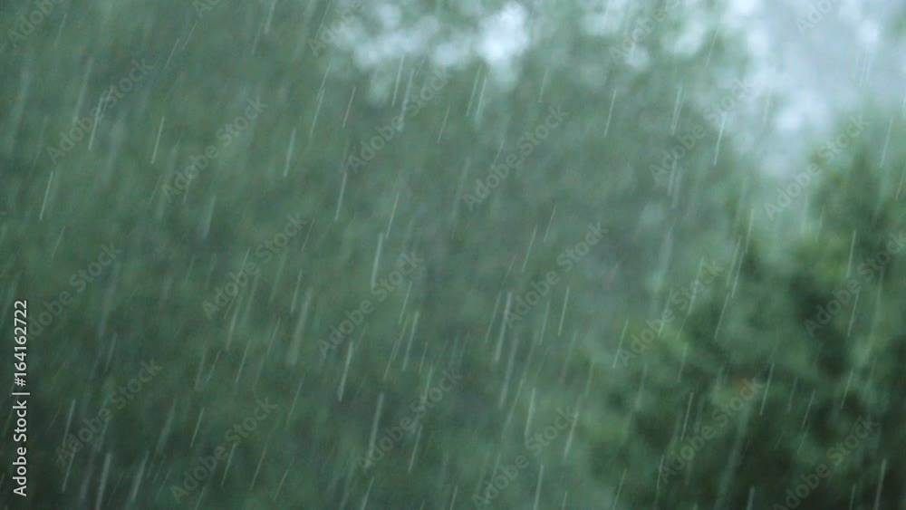 Closeup shot of heavy rain, rain drops - super slow motion, high framerate shot 