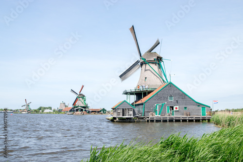 Traditional Dutch windmills with canal near the Amsterdam, Holland