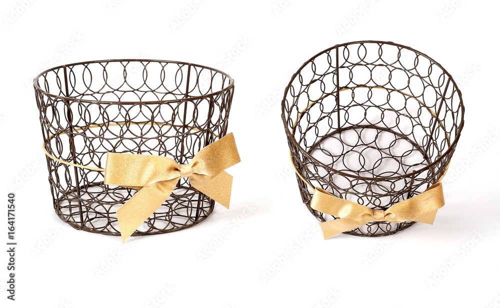 Obraz premium Wicker basket with silk bow for gifts