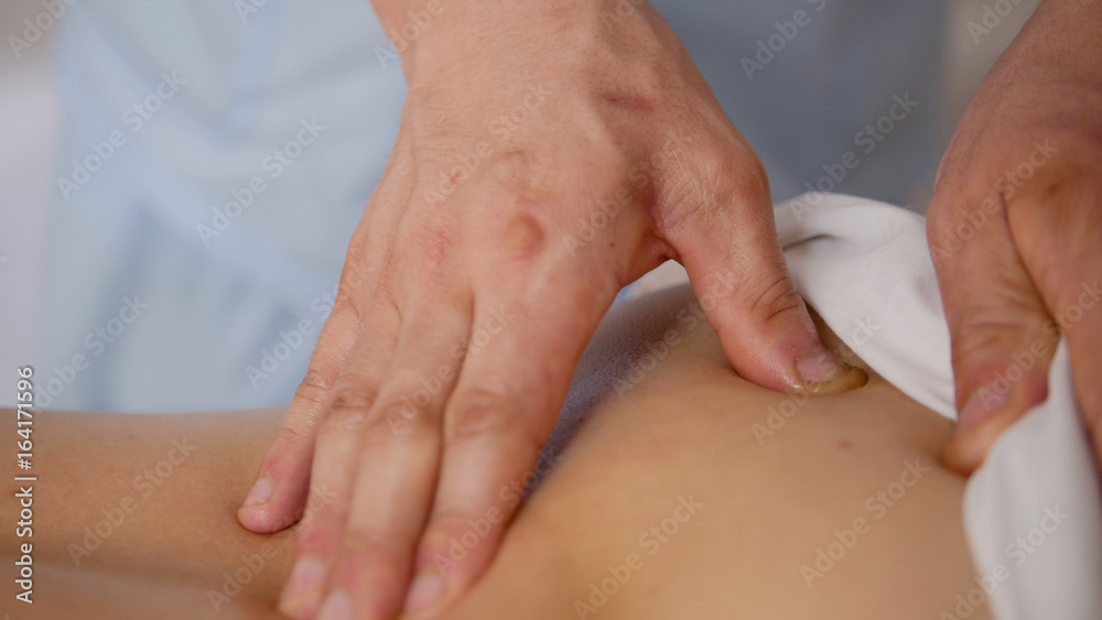Massage parlor. Male hand close-up Massage parlor. Male hand close-up