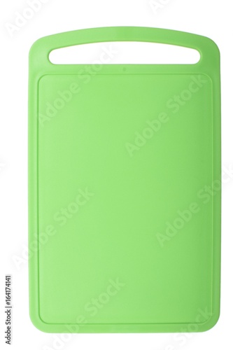 Colored green plastic cutting board, ionized on white background