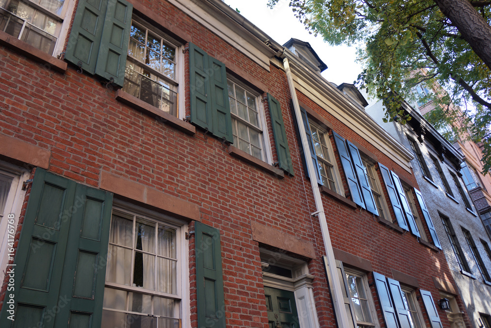 Obraz premium Old Historic townhouses/apartments in the city preserved for dwellings and for tourist interest