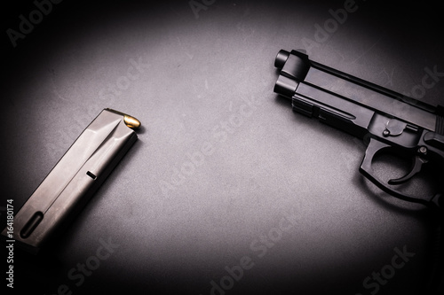  9mm pistol gun on black background photo