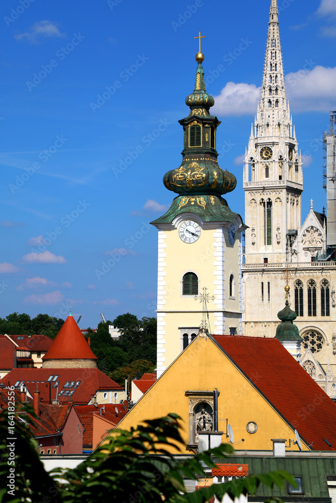 Zagreb skyline with Zagreb Cathedral and St. Mary Church. View from Strossmayer Promenade on Upper Town. 
