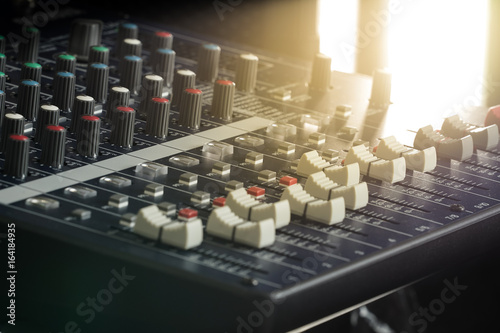 Professional Music Mixer Console with dial knob and slide bar. Professional music recording equipment.