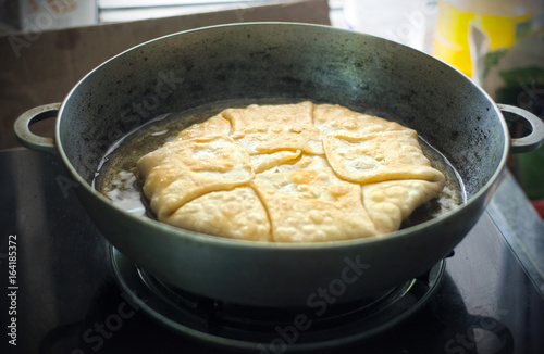 Process of preparation of pies with cheese in a pan