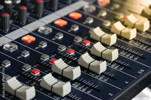 Professional Music Mixer Console with dial knob and slide bar. Professional music recording equipment.