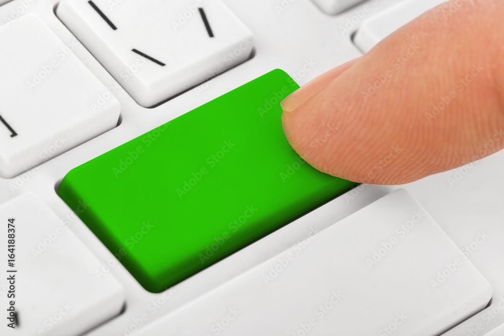 Computer notebook keyboard with blank green key