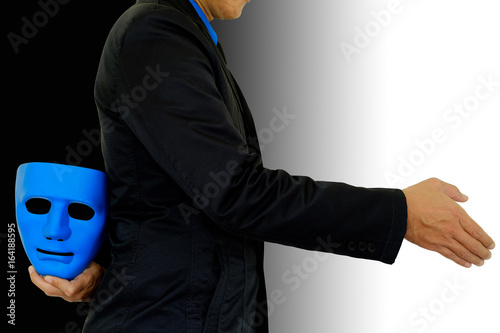 Businessman hide the mask.