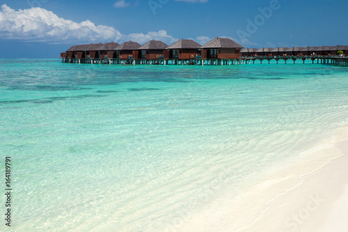 beach with water bungalows at Maldives © Pakhnyushchyy