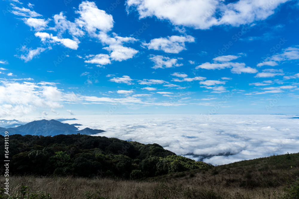 Mist over the mountains with blue sky background at doi inthanon. thailand Mist over the mountains with blue sky background at doi inthanon. thailand