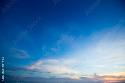 Blue sky background with tiny clouds © Pakhnyushchyy
