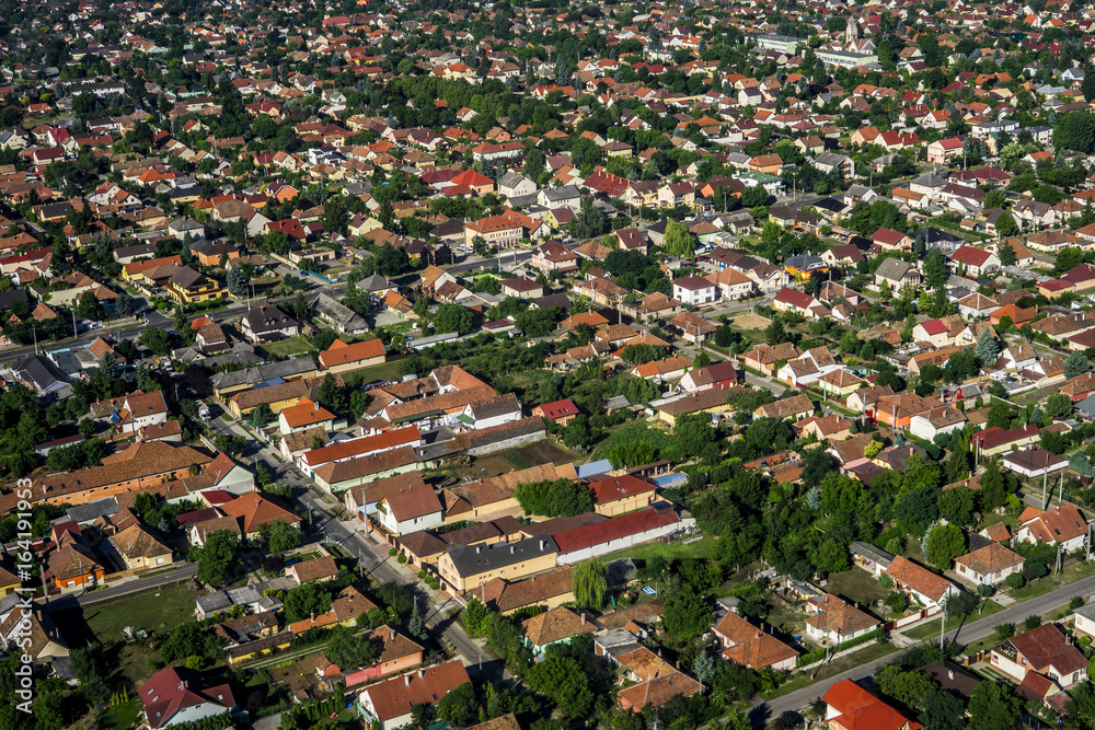 Aerial view above town. Flying above village