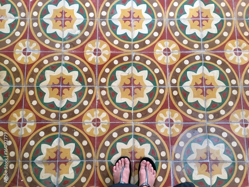 Vintage tiles and feet view