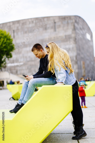 Young people sitting on the...