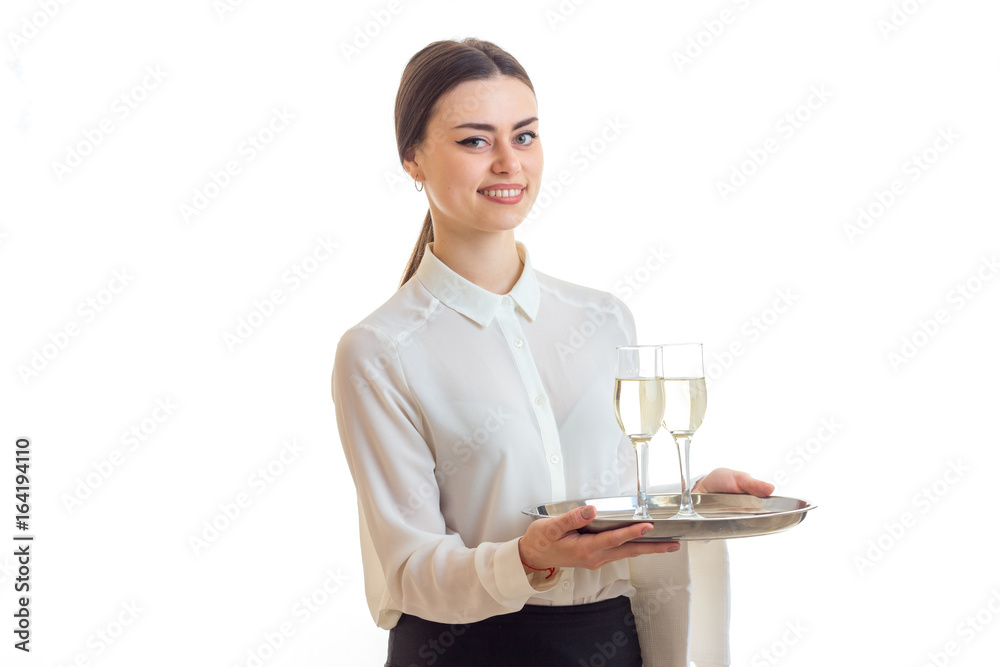 Cheerful girl waitress in uniform smiling