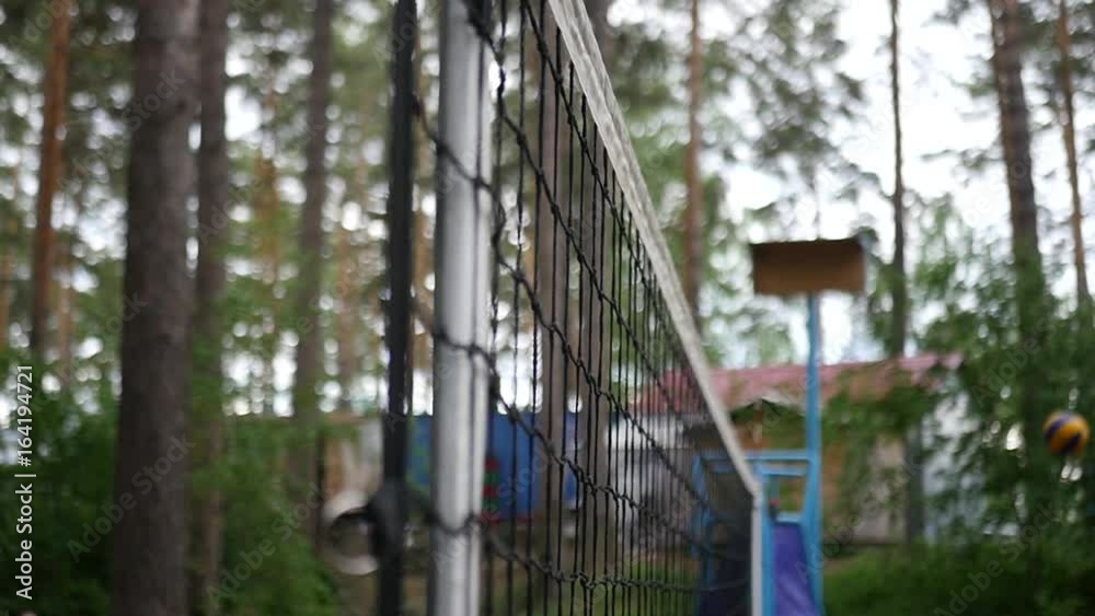 Warm-up on the volleyball court in the forest. SLOW MOTION. HD, 1920x1080. Warm-up on the volleyball court in the forest. SLOW MOTION. HD, 1920x1080.