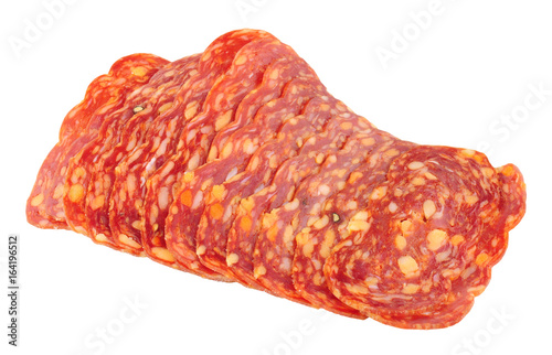 Italian Spianata Piccante salami meat slices isolated on a white background photo
