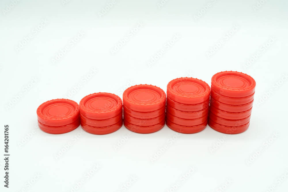Row of coin rising stacks isolated on white Row of coin rising stacks isolated on white