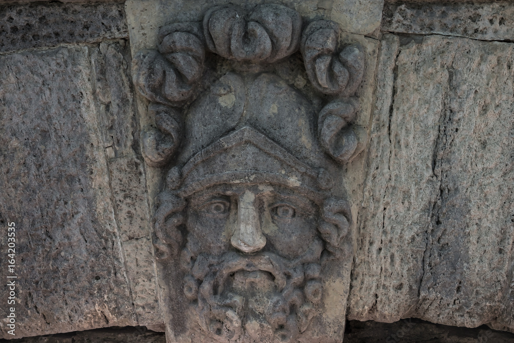 Masks of ancient gods, stone bas-reliefs, Catherine Park in Tsarskoye Selo, Pushkin, Russia