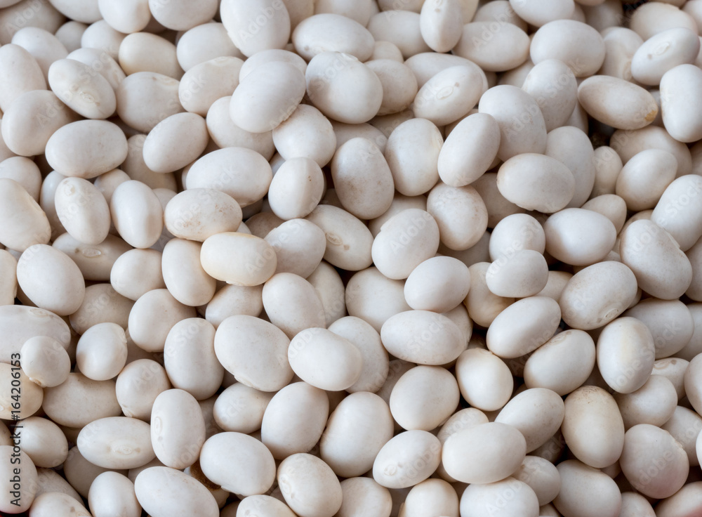 Raw haricot bean. White beans grain background