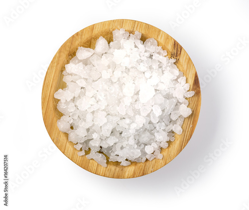 Фотография salt at wooden bowl