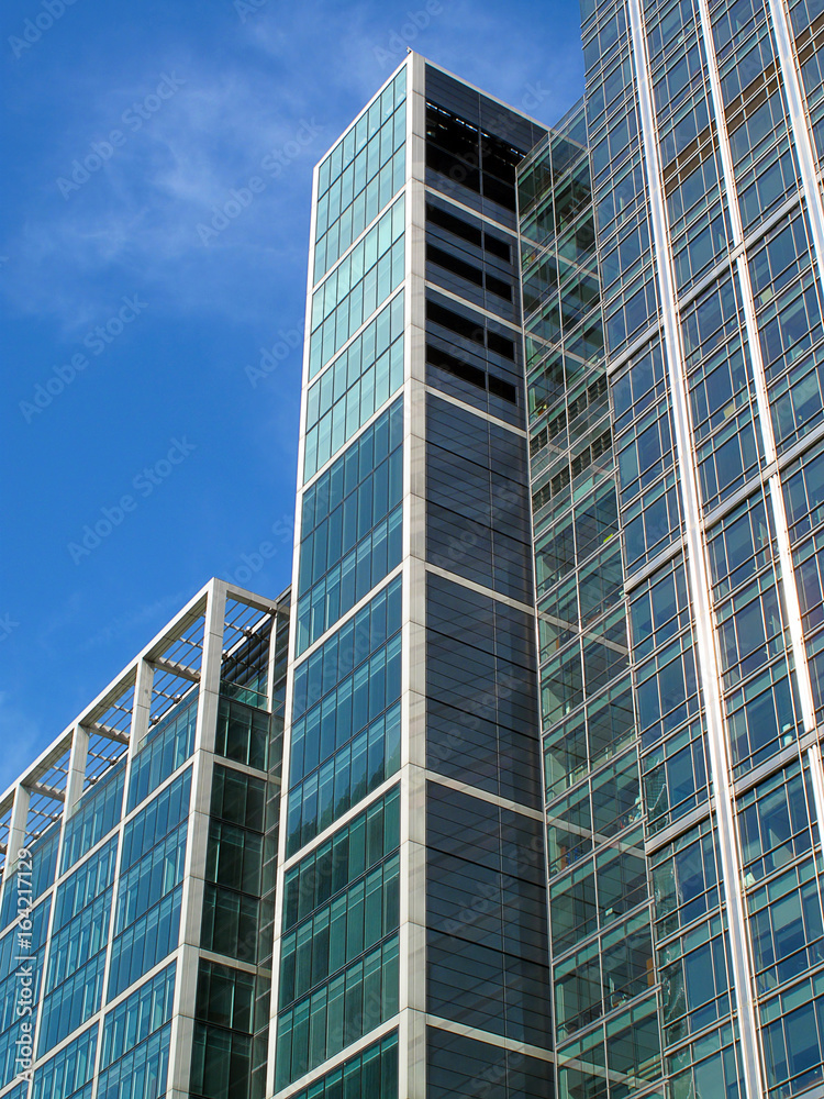 Modern glass skyscraper in Canary Wharf at London's Docklands