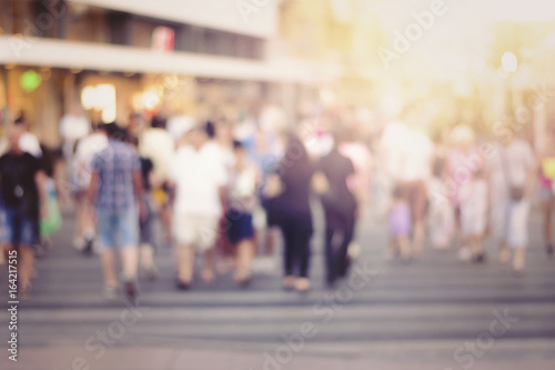 People walking in the street, blurry
