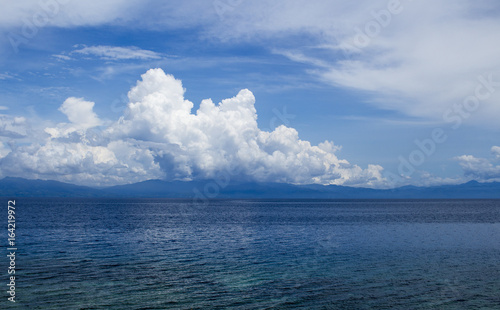 Sea panorama with clouds. Cloudy seascape. Tropical seaside minimal photo. © Elya.Q