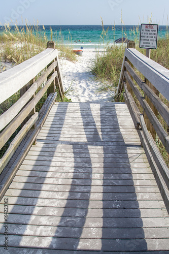 Fototapeta Naklejka Na Ścianę i Meble -  A boardwalk out to the beach in Destin Florida