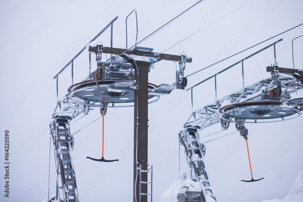 Beautiful cold mountain view of ski resort, sunny winter day with slope, piste and ski lift
Beautiful cold mountain view of ski resort, sunny winter day with slope, piste and ski lift