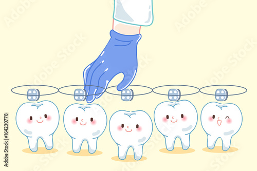 doctor hand picking teeth