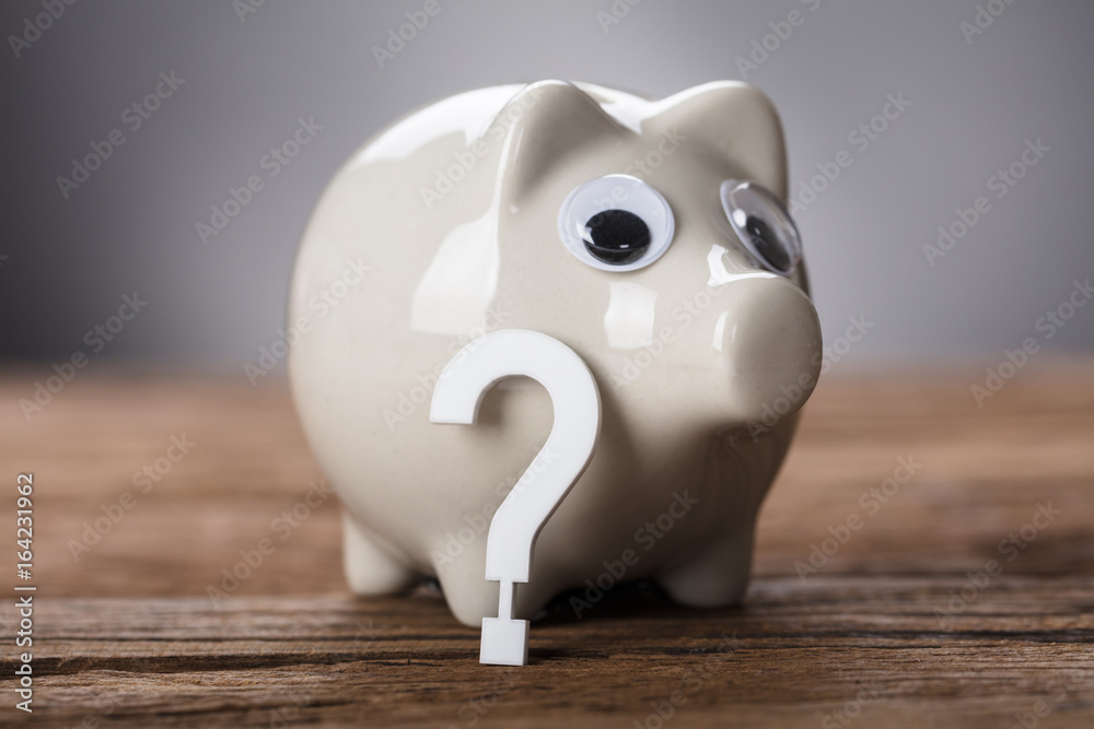 Question Mark Sign And Piggy Bank On Wood Stock Photo Adobe Stock