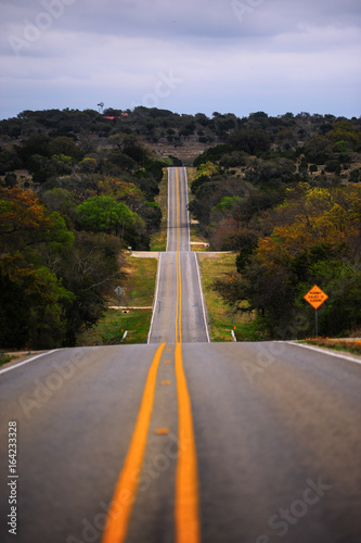 Vanishing point hilly road in Texas Hill Country