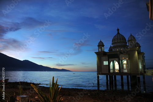 INDONESIA, JAN 8, 2017 :  Beautiful sunrise of Masjid Terapung (Mosque) in Palu, Indonesia photo