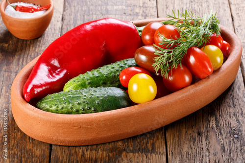 Plate with different fresh vegetables