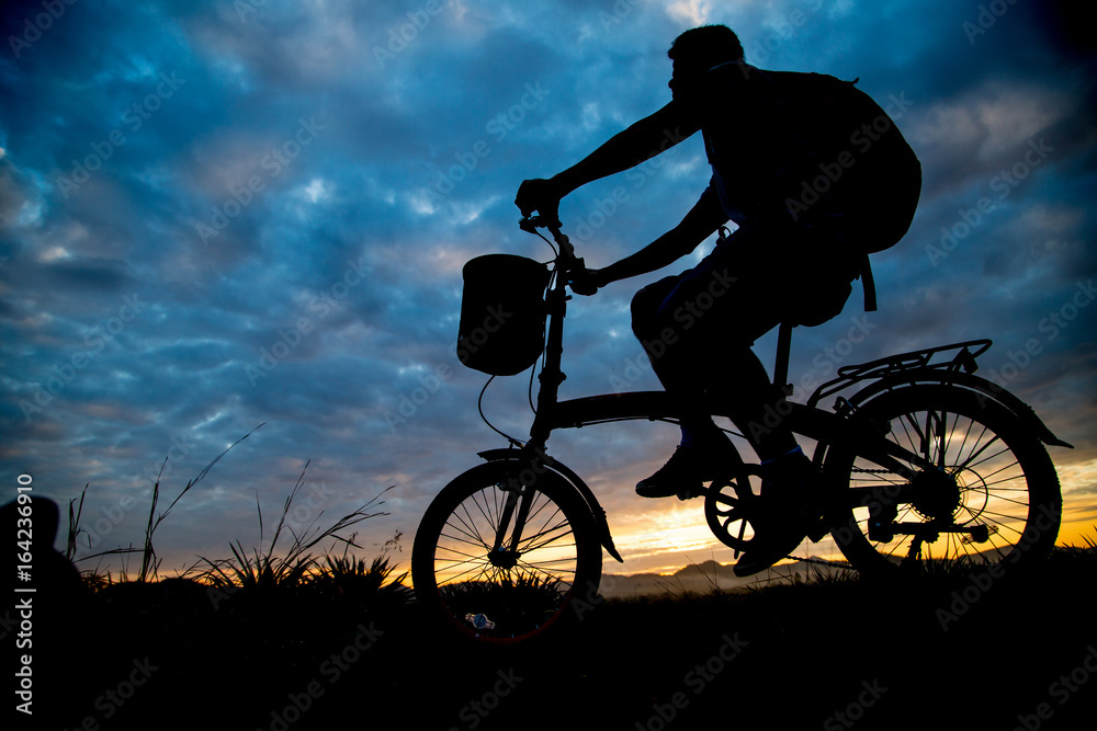 Obraz premium Asian man ride bicycle