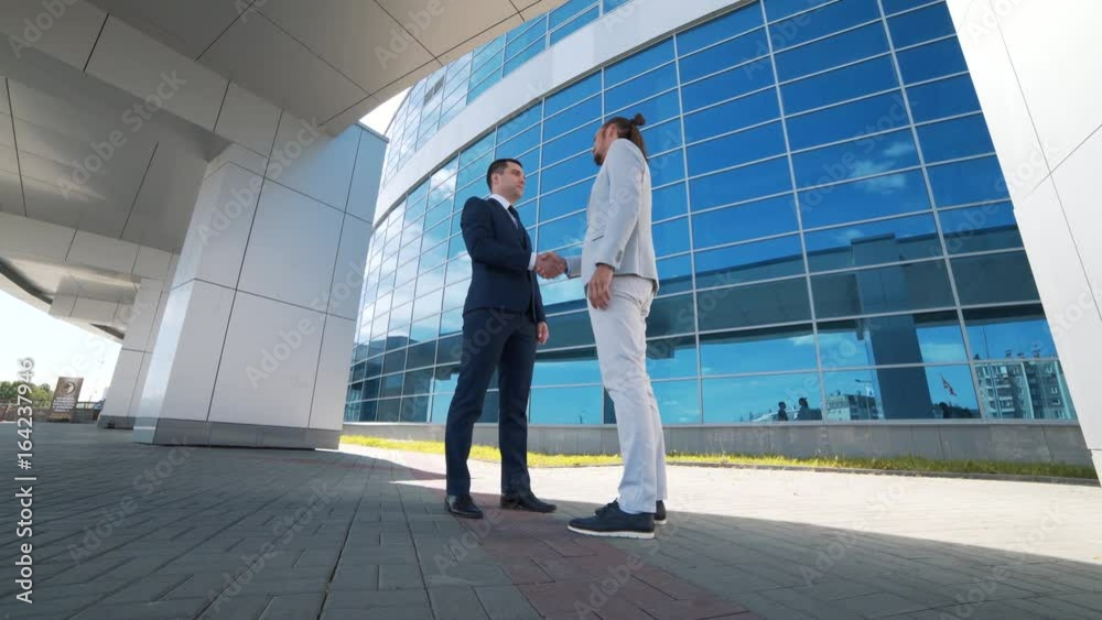 the meeting of two business partners