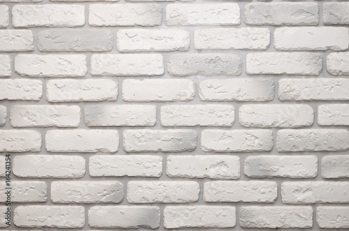 White and light grey brick wall for grunge background.