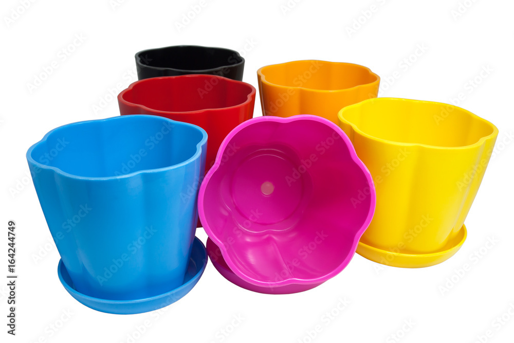 Colorful plastic pots, isolated on a white background. Colorful plastic pots, isolated on a white background.