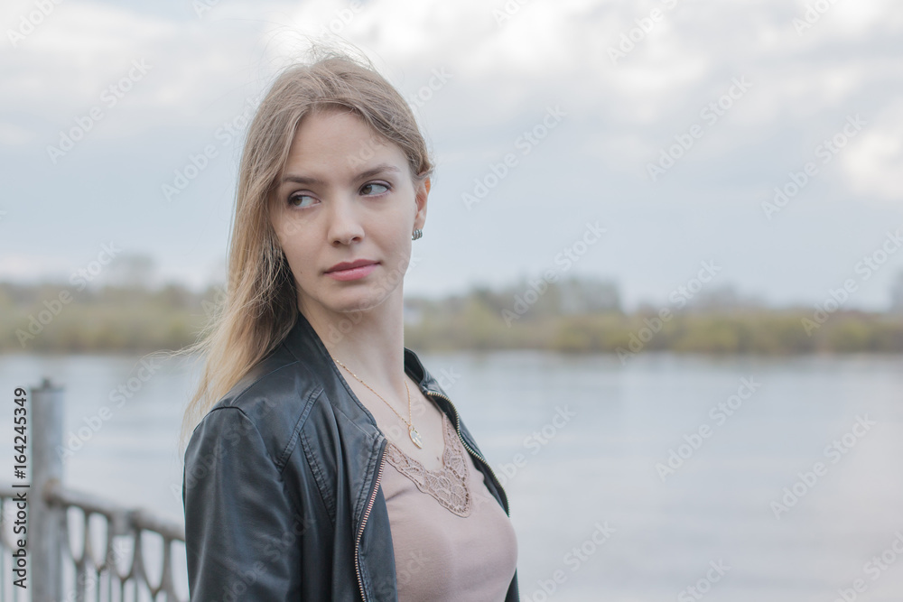 Girl with blond hair on the promenade Girl with blond hair on the promenade