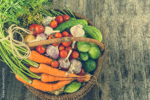 Assorted vegetables  organic food on wooden farm table  overhead